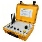 Web-MT magnetotelluric instrument in a rugged yellow case, featuring four wireless antennas for remote data transmission, control knobs, and connection ports for geophysical resistivity surveys.